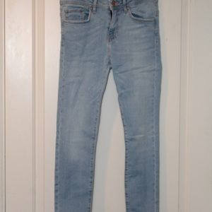 light blue stretchy denim jeans